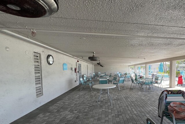 938 Normandy T 938, Delray Beach, FL 33484 - view of patio / terrace featuring outdoor dining space