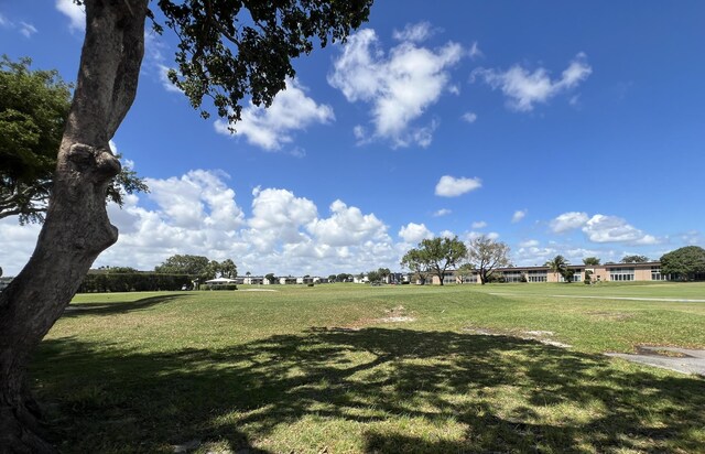 938 Normandy T 938, Delray Beach, FL 33484 - view of home's community featuring a yard