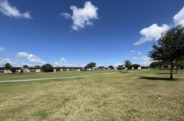 938 Normandy T 938, Delray Beach, FL 33484 - view of home's community featuring a lawn