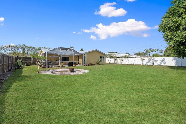 333 SE Dalva Ave, Port Saint Lucie, FL 34984 - view of yard with a lanai