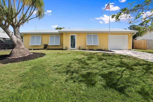 333 SE Dalva Ave, Port Saint Lucie, FL 34984 - ranch-style house with concrete driveway, an attached garage, stucco siding, and metal roof