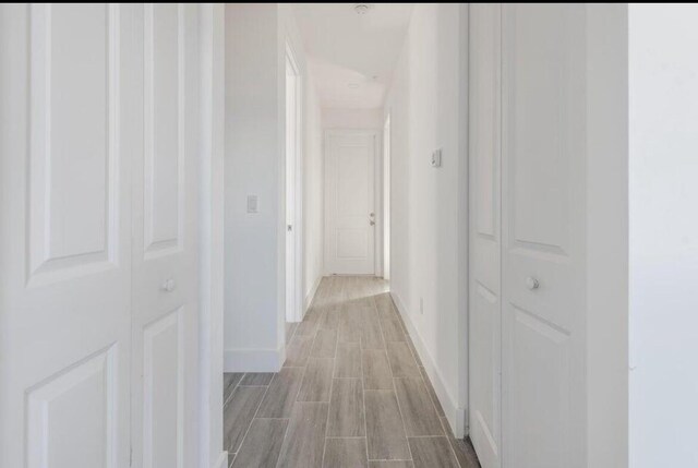 191 Rotonda Blvd W Unit A-B-C, Placida, FL 33947 - hall featuring light wood-style floors and baseboards