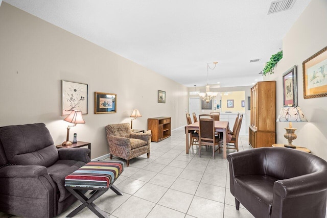 5871 Grand Harbour Cir, Boynton Beach, FL 33437 - living room featuring a chandelier, light tile patterned floors, and baseboards