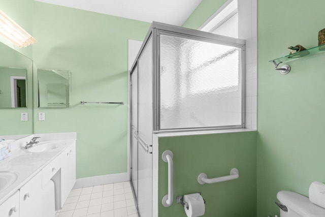 5871 Grand Harbour Cir, Boynton Beach, FL 33437 - full bathroom featuring toilet, double vanity, baseboards, tile patterned flooring, and an enclosed shower