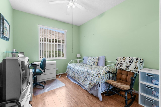 5871 Grand Harbour Cir, Boynton Beach, FL 33437 - bedroom featuring an office area, wood finished floors, ceiling fan, and baseboards