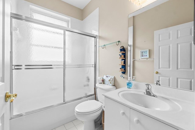 5871 Grand Harbour Cir, Boynton Beach, FL 33437 - full bathroom with vanity, shower / bath combination with glass door, toilet, and tile patterned flooring