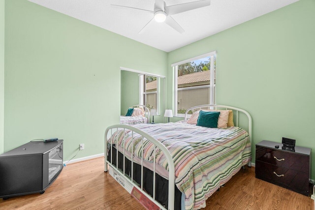 5871 Grand Harbour Cir, Boynton Beach, FL 33437 - bedroom featuring wood finished floors, baseboards, and a ceiling fan