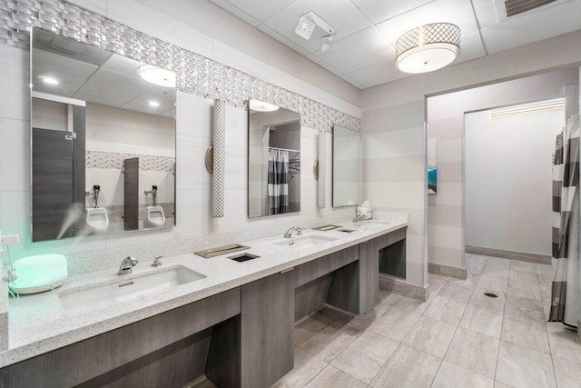 5871 Grand Harbour Cir, Boynton Beach, FL 33437 - full bath with double vanity, a shower with shower curtain, a drop ceiling, and tile patterned floors