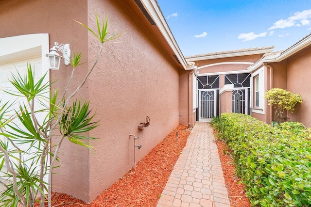 5871 Grand Harbour Cir, Boynton Beach, FL 33437 - view of exterior entry featuring stucco siding