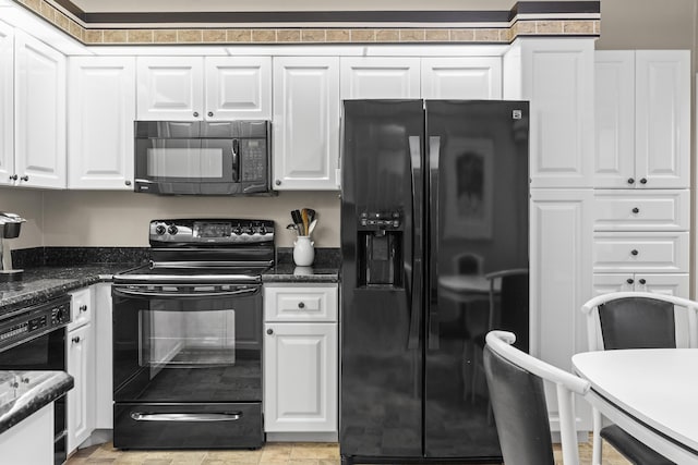 6067 Kings Gate Cir, Delray Beach, FL 33484 - kitchen featuring black appliances and white cabinetry