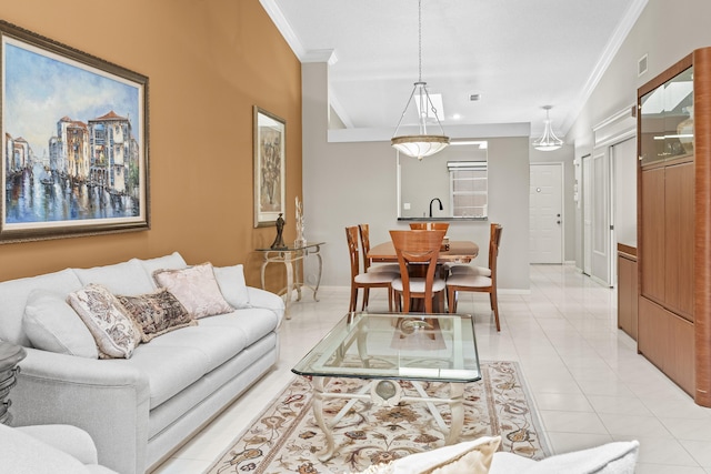 6067 Kings Gate Cir, Delray Beach, FL 33484 - living area featuring ornamental molding, baseboards, and light tile patterned floors