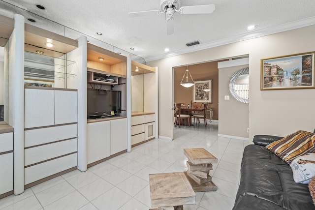 6067 Kings Gate Cir, Delray Beach, FL 33484 - living room featuring ornamental molding, ceiling fan, a textured ceiling, recessed lighting, and light tile patterned flooring
