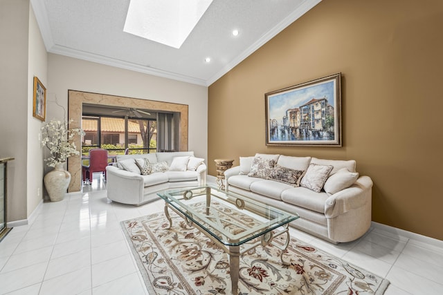 6067 Kings Gate Cir, Delray Beach, FL 33484 - living room with vaulted ceiling, crown molding, light tile patterned flooring, a skylight, and baseboards