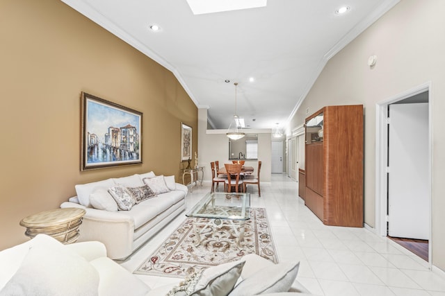 6067 Kings Gate Cir, Delray Beach, FL 33484 - living room featuring ornamental molding, baseboards, a skylight, recessed lighting, and light tile patterned flooring
