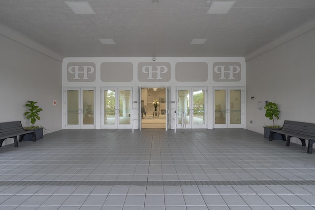 6067 Kings Gate Cir, Delray Beach, FL 33484 - view of patio with french doors