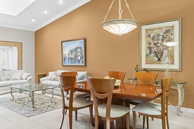 6067 Kings Gate Cir, Delray Beach, FL 33484 - dining area with crown molding, light tile patterned flooring, recessed lighting, and a skylight