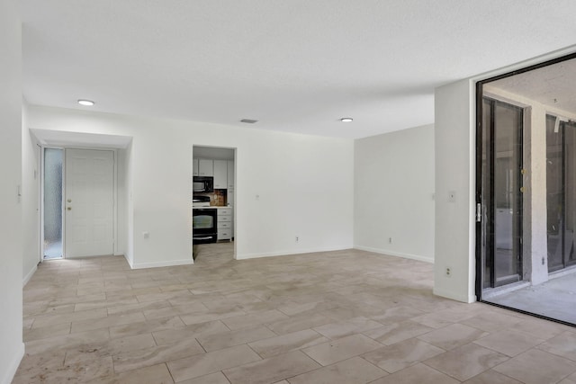 4733 NW 22nd St Unit 4283, Coconut Creek, FL 33063 - spare room with recessed lighting and baseboards