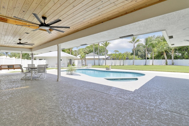 386 NE Ficus Ter, Jensen Beach, FL 34957 - view of pool featuring a patio, ceiling fan, and outdoor dining area