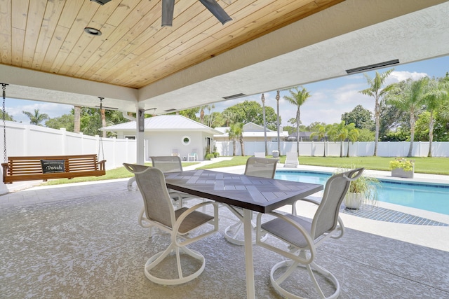 386 NE Ficus Ter, Jensen Beach, FL 34957 - view of patio featuring outdoor dining area and a ceiling fan