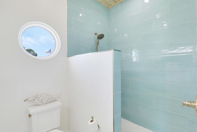 386 NE Ficus Ter, Jensen Beach, FL 34957 - full bathroom with a walk in shower and toilet