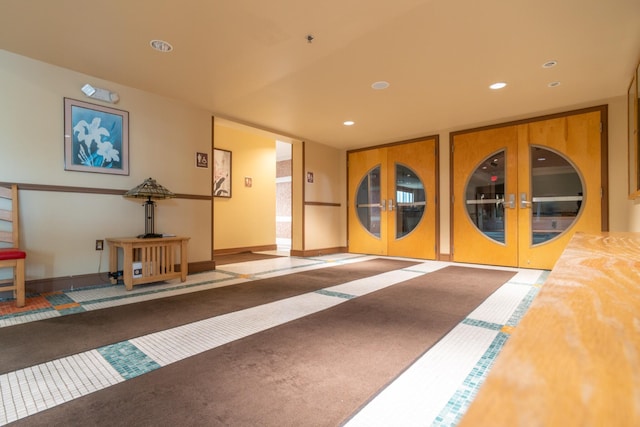 7300 NW 5th Pl Unit 203, Margate, FL 33063 - exercise area featuring carpet floors, recessed lighting, baseboards, and french doors