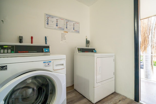 7300 NW 5th Pl Unit 203, Margate, FL 33063 - community laundry room featuring washer and dryer and light wood-style floors