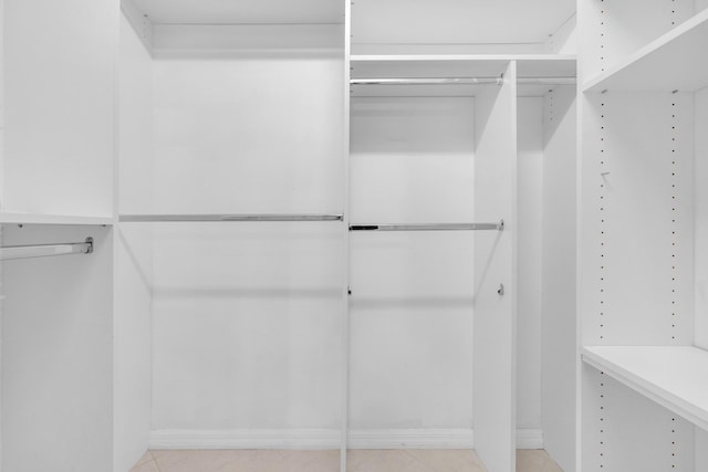 10125 N Military Trl, Palm Beach Gardens, FL 33410 - spacious closet with light tile patterned floors