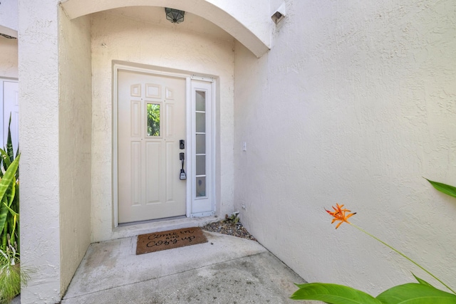 10125 N Military Trl, Palm Beach Gardens, FL 33410 - entrance to property featuring stucco siding