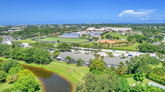 10125 N Military Trl, Palm Beach Gardens, FL 33410 - aerial overview of property's location featuring a nearby body of water and a tree filled landscape