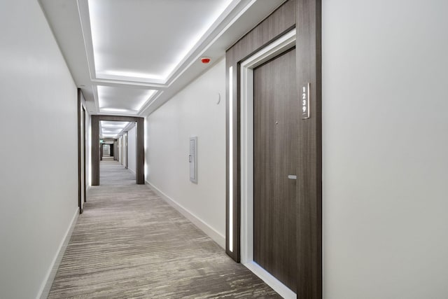 2301 Collins Ave Unit 1239, Miami Beach, FL 33139 - corridor featuring baseboards and light wood-style flooring