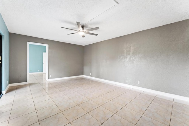 301 Waterview Dr, Palm Springs, FL 33461 - unfurnished room with ceiling fan, a textured ceiling, baseboards, and light tile patterned floors