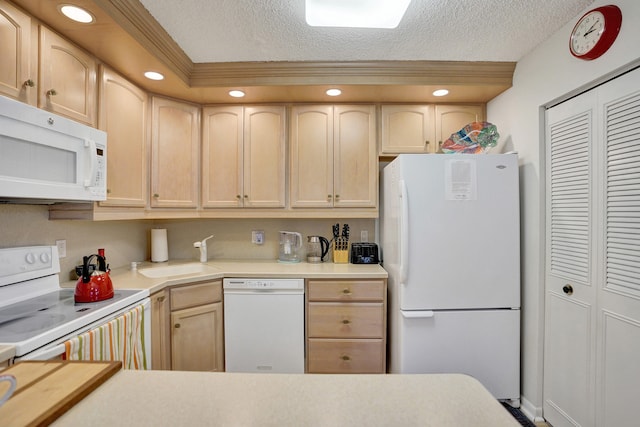 3561 Tall Pine Way Unit B-1, Greenacres, FL 33463 - kitchen featuring white appliances, light brown cabinets, light countertops, a textured ceiling, and recessed lighting