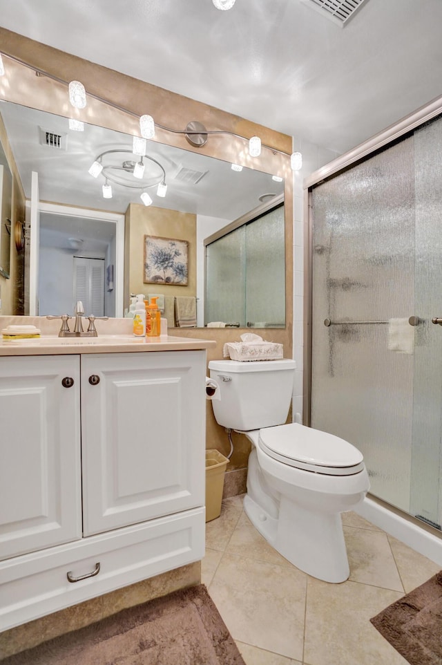 3561 Tall Pine Way Unit B-1, Greenacres, FL 33463 - full bath featuring toilet, tile patterned flooring, vanity, and a shower stall
