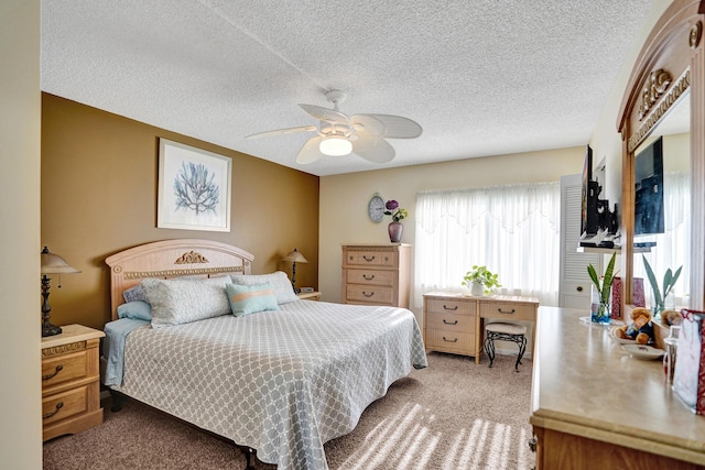 3561 Tall Pine Way Unit B-1, Greenacres, FL 33463 - carpeted bedroom with a textured ceiling and ceiling fan