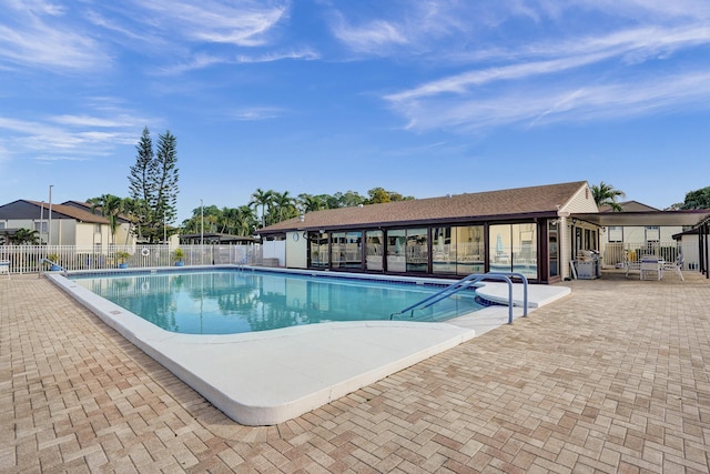 3561 Tall Pine Way Unit B-1, Greenacres, FL 33463 - community pool with a patio