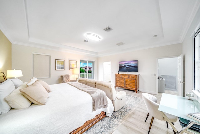 1855 SW Jamesport Dr, Port Saint Lucie, FL 34953 - bedroom with light wood-type flooring, a tray ceiling, and ornamental molding