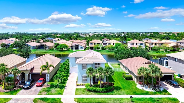 1855 SW Jamesport Dr, Port Saint Lucie, FL 34953 - aerial perspective of suburban area with a nearby body of water