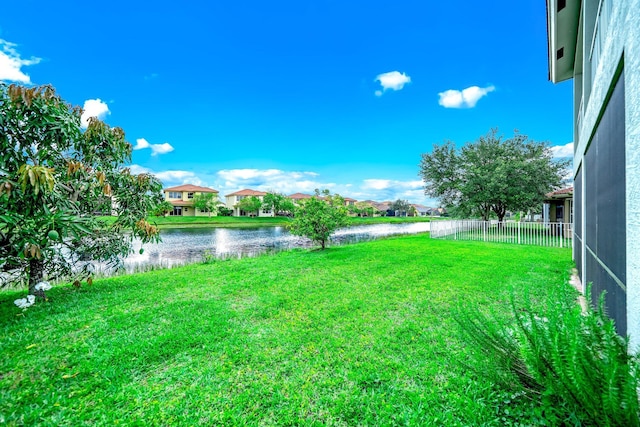 1855 SW Jamesport Dr, Port Saint Lucie, FL 34953 - view of yard with a water view and a residential view