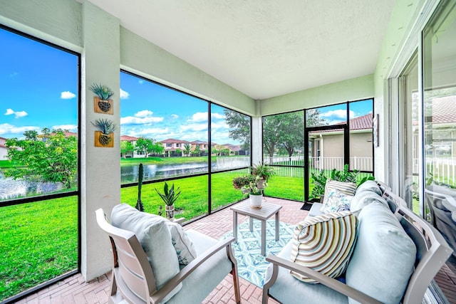 1855 SW Jamesport Dr, Port Saint Lucie, FL 34953 - sunroom / solarium with a water view and an outdoor hangout area