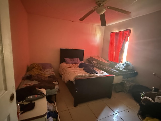 416 SE Calmoso Dr, Port Saint Lucie, FL 34983 - bedroom featuring light tile patterned floors and ceiling fan