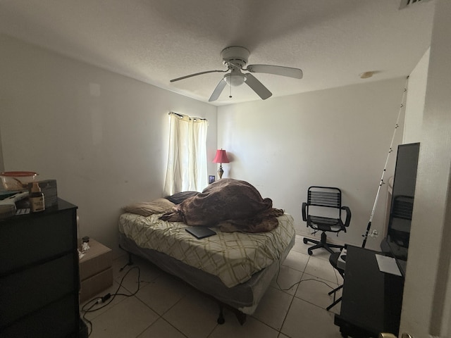 416 SE Calmoso Dr, Port Saint Lucie, FL 34983 - bedroom featuring ceiling fan and light tile patterned floors