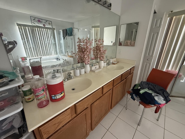 416 SE Calmoso Dr, Port Saint Lucie, FL 34983 - bathroom featuring double vanity, a stall shower, tile patterned flooring, and a bath