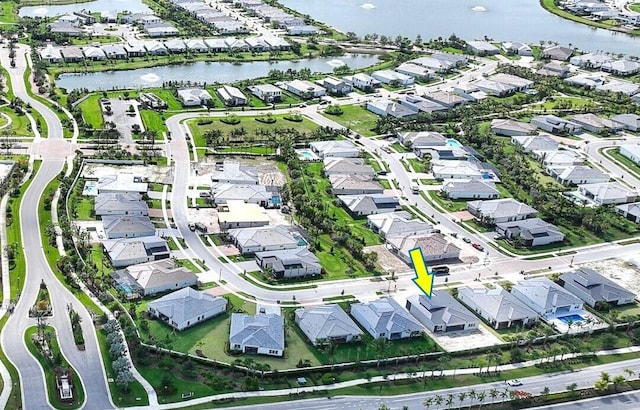 10742 Stellar Cir Unit 11, Palm Beach Gardens, FL 33412 - aerial view of property and surrounding area with nearby suburban area and a large body of water