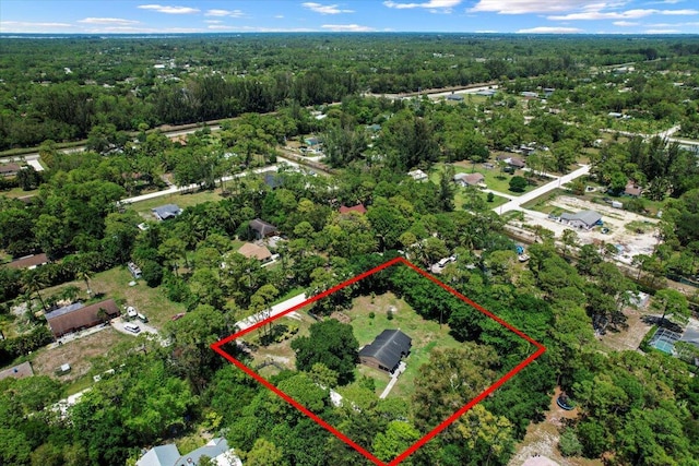 13704 58th Ct N, The Acreage, FL 33411 - aerial overview of property's location featuring a forest and property parcel outlined