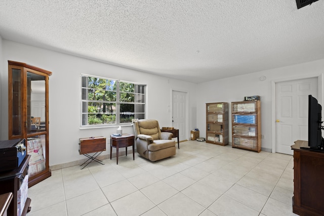 13704 58th Ct N, The Acreage, FL 33411 - living area with a textured ceiling and light tile patterned floors