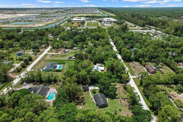 13704 58th Ct N, The Acreage, FL 33411 - aerial view of property and surrounding area with a nearby body of water and a pool area