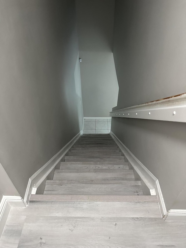 6644 Country Winds Cv, Lake Worth, FL 33463 - stairway featuring wood finished floors and baseboards