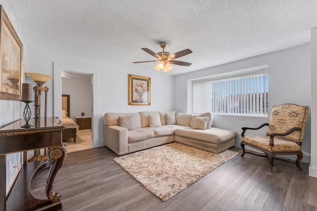 18905 Cloud Lake Cir, Boca Raton, FL 33496 - living room with wood finished floors, a ceiling fan, and a textured ceiling