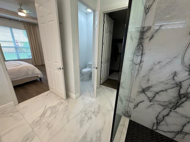 9624 SW Royal Poinciana Dr, Port Saint Lucie, FL 34987 - full bath with a marble finish shower, toilet, marble finish floors, ensuite bathroom, and ceiling fan
