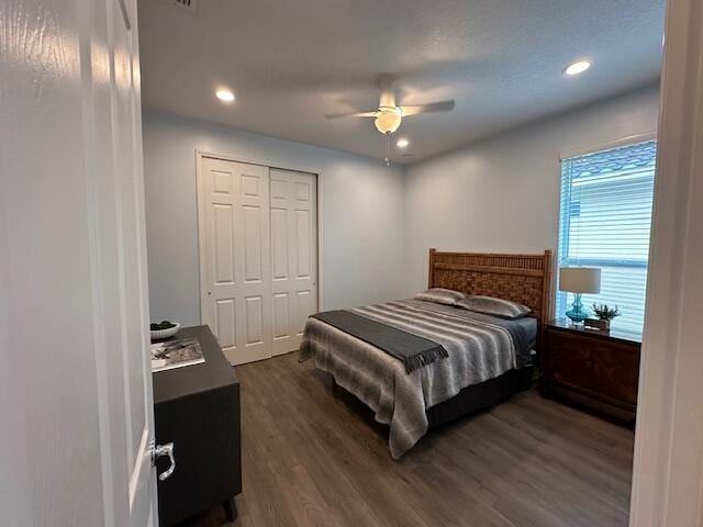 9624 SW Royal Poinciana Dr, Port Saint Lucie, FL 34987 - bedroom with dark wood finished floors, recessed lighting, a closet, and a ceiling fan